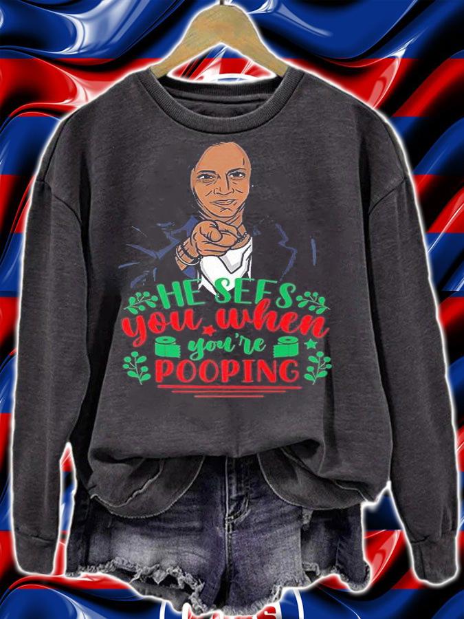 He Sees You When You're Pooping Kamala Harris T-Shirt t-shirt sweatshirt