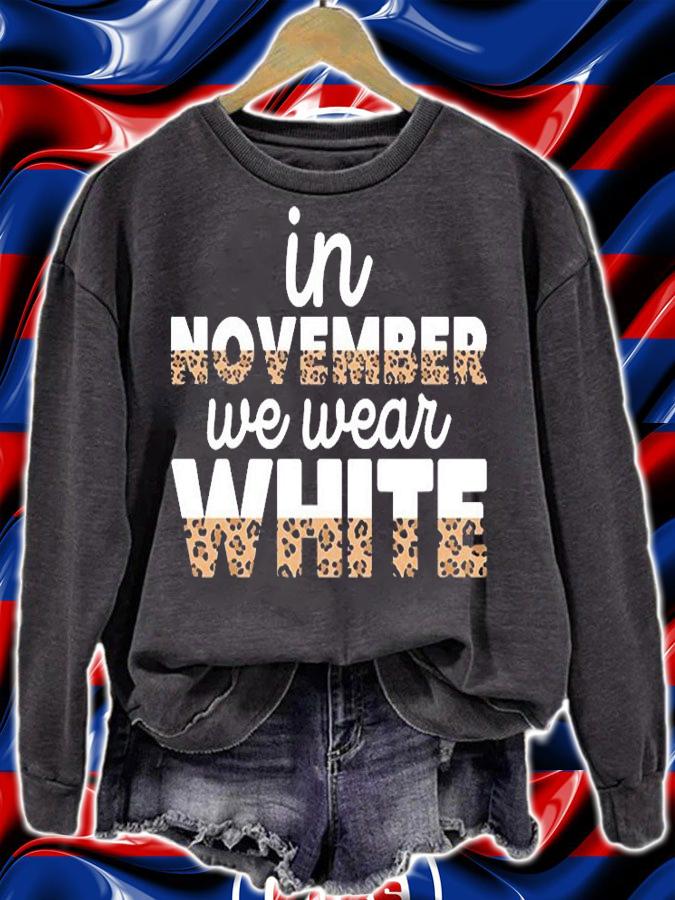 in November we Wear White Leopard T-Shirt sweatshirt